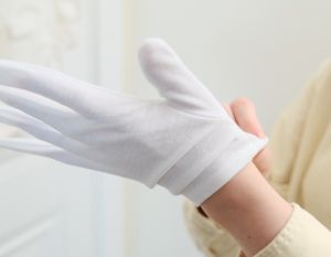 A Pool Table Installer Putting On A White Glove For A Delivery